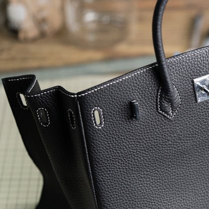 ملحقات الحقيبة الجلدية: حقيبة كلاتش مستوحاة من كيلي DWIPDFZS169