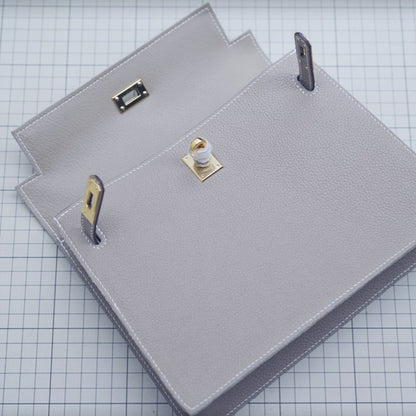 ملحقات الحقيبة الجلدية: حقيبة كلاتش مستوحاة من كيلي DWIPDFZS169