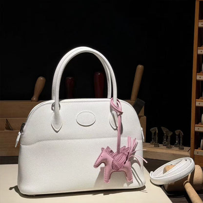 ملحقات الحقيبة الجلدية: حقيبة كلاتش مستوحاة من كيلي DWIPDFZS169